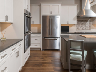 White kitchen cabinets with recessed panel doors