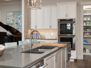 White kitchen cabinets with recessed panel doors