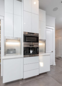 White Glass Coffee Bar with glass tambour doors