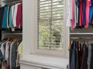 White painted window seat with lower drawers
